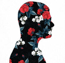 A floral silhouette of a side profile on a white background.